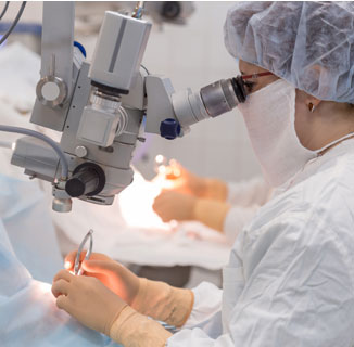 Picture of a Doctor performing LASIK surgery